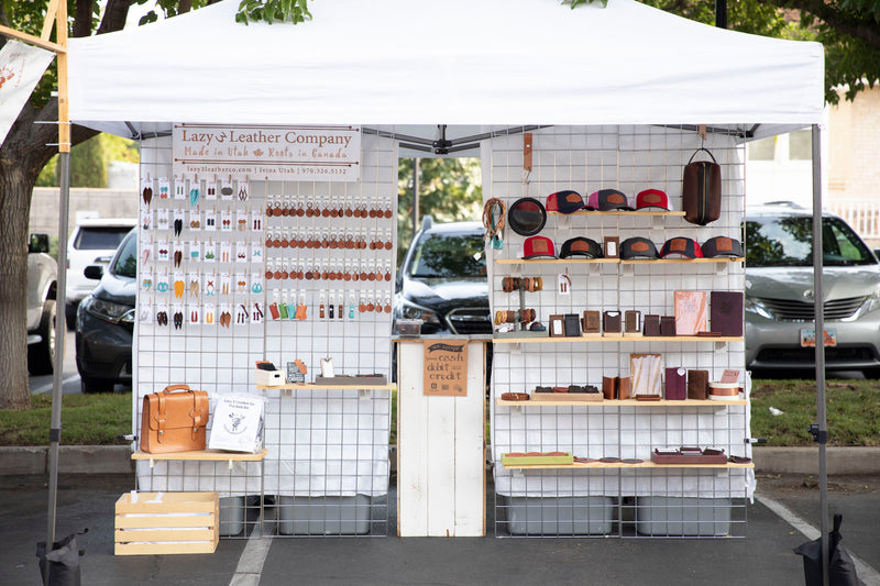 Picture of Lazy 3 Leather Co. booth set up at the Downtown Farmers Market in St. George Utah. Summer of 2021