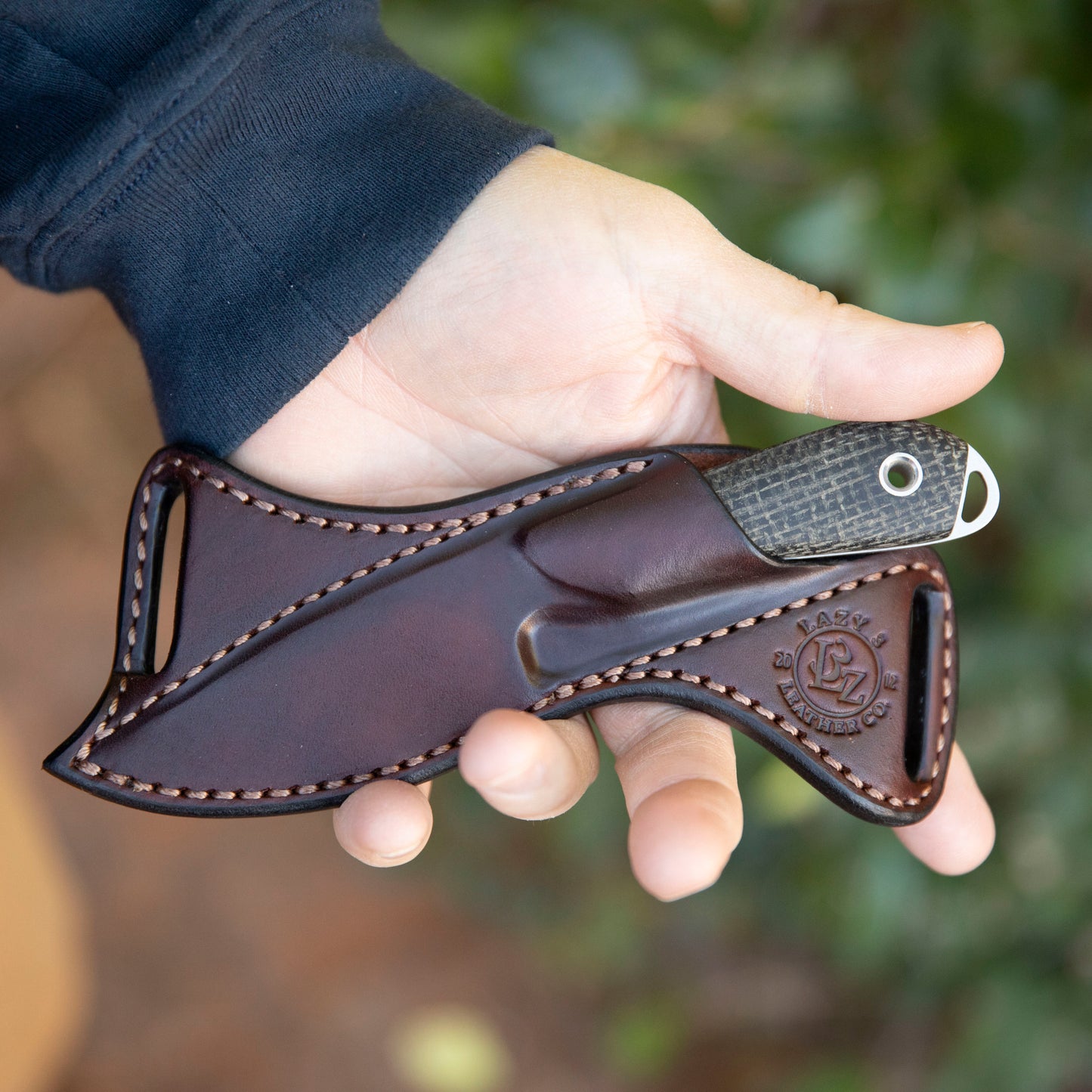 Custom leather scout sheath for White River M1 Caper