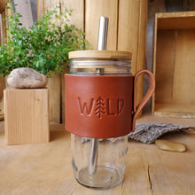 Load image into Gallery viewer, Wild leather wrapped jar with hand and bamboo lid. Lid has a straw hole and comes with a boba 304 stainless steel. Made by Lazy 3 Leather Co.  