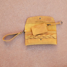 Load image into Gallery viewer, leather wristlet clutch made using tandy leather denver side in yellow