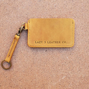 minimal wallet with keyfob. antique brass hardward. lazy 3 leather co wallet in Tandy Denver side in yellow
