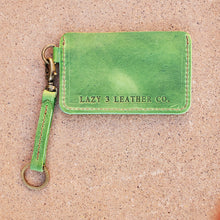 Load image into Gallery viewer, minimal wallet with keyfob. antique brass hardward. lazy 3 leather co wallet in Tandy Denver side in green