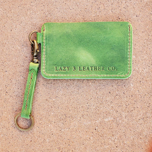 minimal wallet with keyfob. antique brass hardward. lazy 3 leather co wallet in Tandy Denver side in green