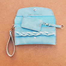 Load image into Gallery viewer, Wristlet leather clutch made by Lazy 3 Leather Co. in  Tandy Leather&#39;s Denver side in Aqua blue. with a minimal wallet with keyfob. antique brass hardward. lazy 3 leather co wallet in Tandy Denver side in Aqua.