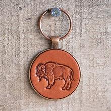 Load image into Gallery viewer, hanging leather keychain with a buffalo stamped into it